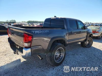 Trzecie zdjęcie samochodu z tyłu: 2019 TOYOTA TACOMA TRD OFF-ROAD VIN:5TFCZ5ANXKX170886 - miniatura