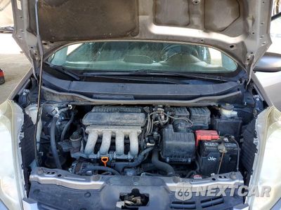 Zdjęcie 11 z 12 samochodu: 2009 HONDA FIT SPORT VIN:JHMGE88429S065471 - miniatura
