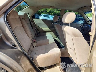 Zdjęcie 10 z 13 samochodu: 2000 MAZDA 626 ES VIN:1YVGF22C3Y5169387 - miniatura