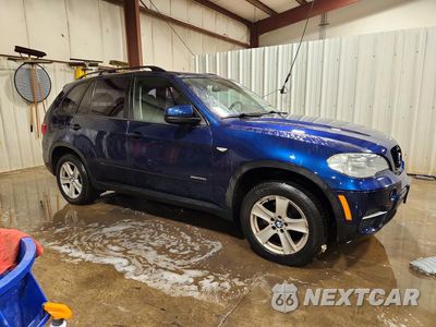 Czwarte zdjęcie samochodu z boku: 2013 BMW X5 XDRIVE35I VIN:5UXZV4C51D0B03913 - miniatura