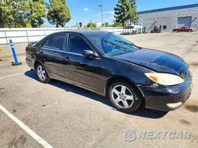 Czwarte zdjęcie samochodu z boku: 2002 TOYOTA CAMRY SE VIN:JTDBE32KX20034587 - miniatura