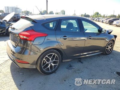 Trzecie zdjęcie samochodu z tyłu: 2016 FORD FOCUS SE VIN:1FADP3K2XGL405603 - miniatura