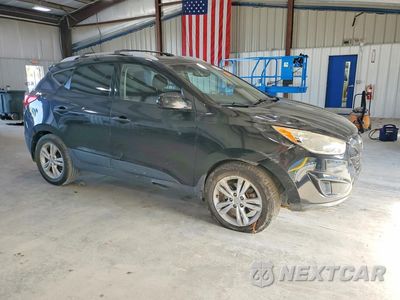 Czwarte zdjęcie samochodu z boku: 2011 HYUNDAI TUCSON GLS VIN:KM8JUCAC7BU200352 - miniatura