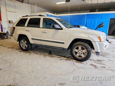 Czwarte zdjęcie samochodu z boku: 2007 JEEP GRAND CHEROKEE LAREDO VIN:1J8GR48KX7C692089 - miniatura