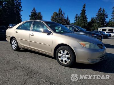 Czwarte zdjęcie samochodu z boku: 2004 TOYOTA CAMRY LE VIN:4T1BE32K34U820643 - miniatura