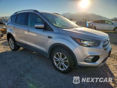 Czwarte zdjęcie samochodu z boku: 2018 FORD ESCAPE SE VIN:1FMCU9GD7JUC60805 - miniatura