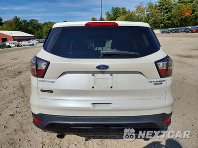 Zdjęcie 6 z 14 samochodu: 2017 FORD ESCAPE TITANIUM VIN:1FMCU9JD7HUD01601 - miniatura