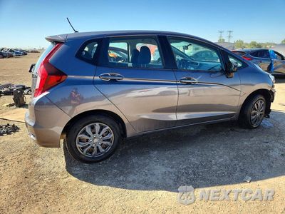 Trzecie zdjęcie samochodu z tyłu: 2019 HONDA FIT LX VIN:3HGGK5H4XKM743277 - miniatura