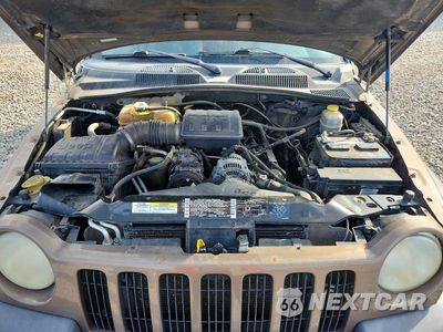 Zdjęcie 11 z 12 samochodu: 2002 JEEP LIBERTY SPORT VIN:1J4GL48K42W187045 - miniatura
