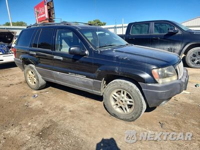 Czwarte zdjęcie samochodu z boku: 2004 JEEP GRAND CHEROKEE LAREDO VIN:1J4GW48S24C181918 - miniatura