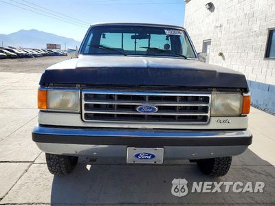 Piąte zdjęcie samochodu w środku: 1990 FORD F250 VIN:1FTHF26H5LPA78439 - miniatura