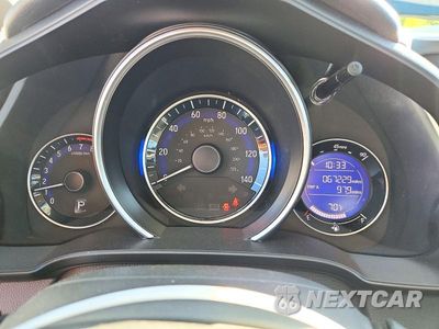 Zdjęcie 9 z 12 samochodu: 2016 HONDA FIT LX VIN:JHMGK5H59GS009749 - miniatura