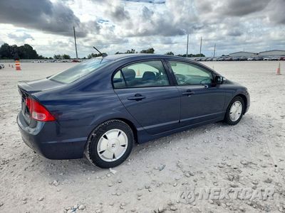 Trzecie zdjęcie samochodu z tyłu: 2006 HONDA CIVIC HYBRID VIN:JHMFA36296S012869 - miniatura