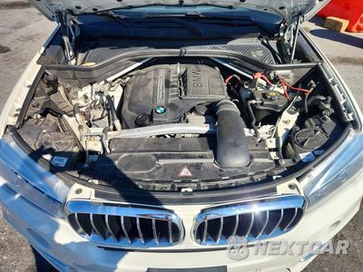 Zdjęcie 12 z 13 samochodu: 2014 BMW X5 XDRIVE35I VIN:5UXKR0C52E0H19846 - miniatura