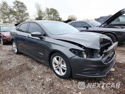 Czwarte zdjęcie samochodu z boku: 2018 FORD FUSION SE HYBRID VIN:3FA6P0LUXJR109271 - miniatura