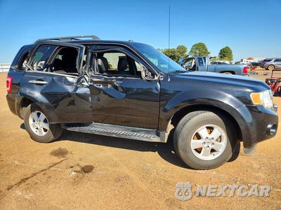 Czwarte zdjęcie samochodu z boku: 2011 FORD ESCAPE XLT VIN:1FMCU0DG1BKA49297 - miniatura