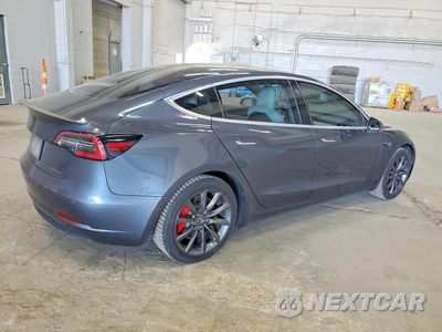 Trzecie zdjęcie samochodu z tyłu: 2020 TESLA MODEL 3 VIN:5YJ3E1EC6LF641764 - miniatura