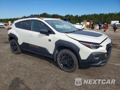 Czwarte zdjęcie samochodu z boku: 2024 SUBARU CROSSTREK WILDERNESS VIN:4S4GUHU67R3809163 - miniatura