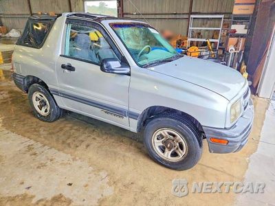 Czwarte zdjęcie samochodu z boku: 1999 CHEVROLET TRACKER VIN:2CNBJ186XX6915553 - miniatura