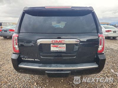 Zdjęcie 6 z 12 samochodu: 2017 GMC YUKON XL DENALI VIN:1GKS2HKJXHR197648 - miniatura