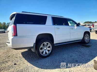 Trzecie zdjęcie samochodu z tyłu: 2015 GMC YUKON XL K1500 SLE VIN:1GKS2GKC7FR743900 - miniatura