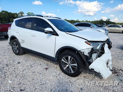 Czwarte zdjęcie samochodu z boku: 2018 TOYOTA RAV4 XLE VIN:JTMWFREV3JJ734077 - miniatura