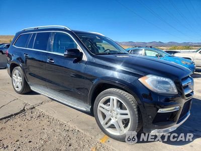 Czwarte zdjęcie samochodu z boku: 2014 MERCEDES-BENZ GL 550 4MATIC VIN:4JGDF7DE8EA300221 - miniatura
