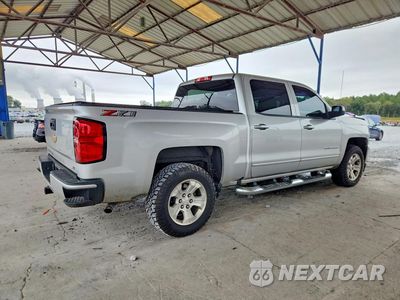 Trzecie zdjęcie samochodu z tyłu: 2018 CHEVROLET SILVERADO K1500 LT VIN:3GCUKREC5JG499734 - miniatura