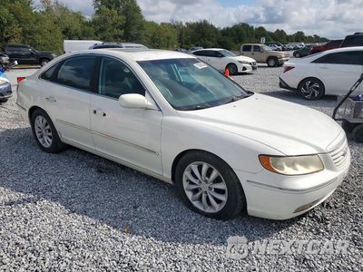 Czwarte zdjęcie samochodu z boku: 2006 HYUNDAI AZERA SE VIN:KMHFC46F66A120484 - miniatura