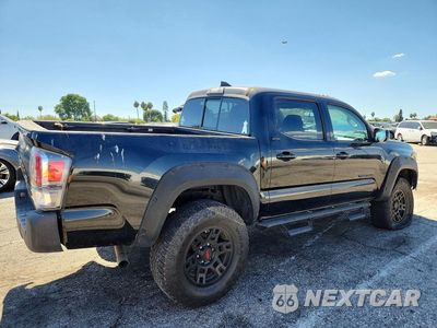 Trzecie zdjęcie samochodu z tyłu: 2019 TOYOTA TACOMA SR5 VIN:5TFAX5GN5KX135449 - miniatura