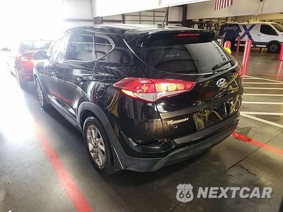 Trzecie zdjęcie samochodu z tyłu: 2016 HYUNDAI TUCSON SE VIN:KM8J23A46GU196073 - miniatura