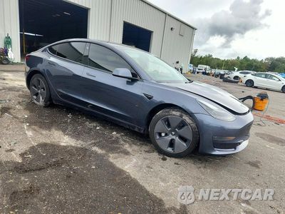 Czwarte zdjęcie samochodu z boku: 2023 TESLA MODEL 3 VIN:5YJ3E1EA2PF711572 - miniatura