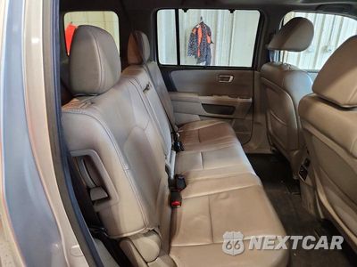 Zdjęcie 11 z 13 samochodu: 2012 HONDA PILOT TOURING VIN:5FNYF4H9XCB079839 - miniatura