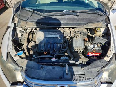 Zdjęcie 11 z 12 samochodu: 2010 HONDA INSIGHT EX VIN:JHMZE2H76AS018254 - miniatura
