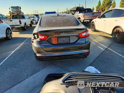 Zdjęcie 6 z 13 samochodu: 2015 FORD FUSION TITANIUM HEV VIN:3FA6P0RU5FR283148 - miniatura