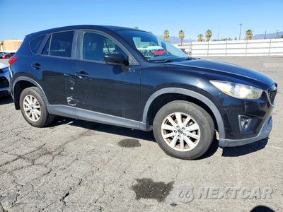Czwarte zdjęcie samochodu z boku: 2014 MAZDA CX-5 TOURING VIN:JM3KE2CY1E0354485 - miniatura
