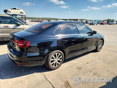 Trzecie zdjęcie samochodu z tyłu: 2018 VOLKSWAGEN JETTA SE VIN:3VWDB7AJXJM234461 - miniatura