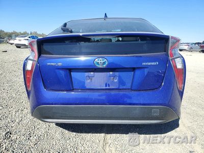 Zdjęcie 6 z 12 samochodu: 2017 TOYOTA PRIUS TWO VIN:JTDKBRFU6H3542621 - miniatura