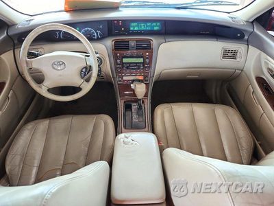 Zdjęcie 8 z 12 samochodu: 2002 TOYOTA AVALON XLS VIN:4T1BF28B82U200074 - miniatura
