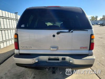 Zdjęcie 6 z 13 samochodu: 2004 GMC YUKON DENALI VIN:1GKEK63U04J296062 - miniatura