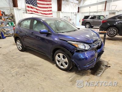 Czwarte zdjęcie samochodu z boku: 2016 HONDA HR-V LX VIN:3CZRU6H30GM716525 - miniatura