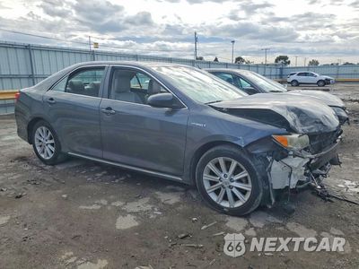 Czwarte zdjęcie samochodu z boku: 2012 TOYOTA CAMRY HYBRID XLE VIN:4T1BD1FK1CU022013 - miniatura