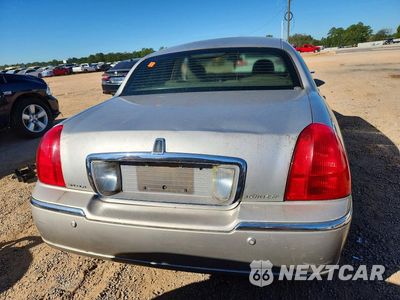 Zdjęcie 6 z 12 samochodu: 2004 LINCOLN TOWN CAR EXECUTIVE VIN:1LNHM81W14Y644733 - miniatura