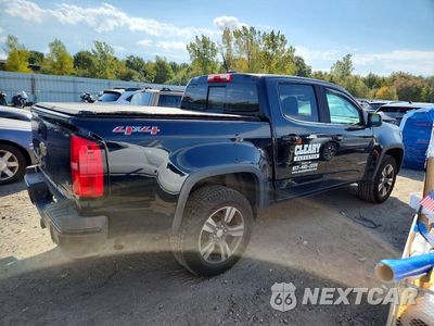 Trzecie zdjęcie samochodu z tyłu: 2018 CHEVROLET COLORADO LT VIN:1GCGTCENXJ1201315 - miniatura