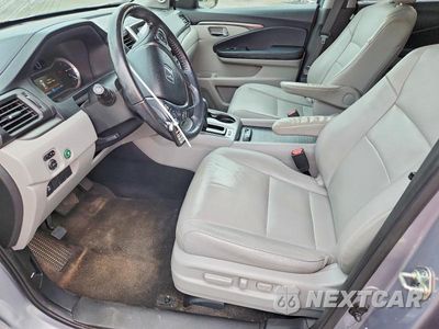 Zdjęcie 7 z 13 samochodu: 2017 HONDA PILOT EXL VIN:5FNYF5H50HB037044 - miniatura