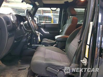 Zdjęcie 7 z 13 samochodu: 2012 JEEP WRANGLER UNLIMITED RUBICON VIN:1C4BJWFGXCL108514 - miniatura