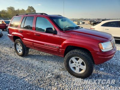 Czwarte zdjęcie samochodu z boku: 2002 JEEP GRAND CHEROKEE OVERLAND VIN:1J8GW68J82C178634 - miniatura
