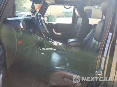 Zdjęcie 7 z 13 samochodu: 2014 JEEP WRANGLER UNLIMITED RUBICON VIN:1C4HJWFG1EL220681 - miniatura