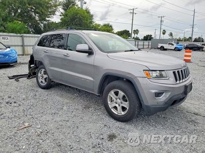 Czwarte zdjęcie samochodu z boku: 2016 JEEP GRAND CHEROKEE VIN:1C4RJFAG4GC318750 - miniatura