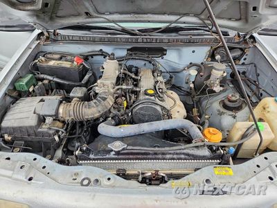 Zdjęcie 11 z 12 samochodu: 1999 CHEVROLET TRACKER VIN:2CNBJ186XX6915553 - miniatura